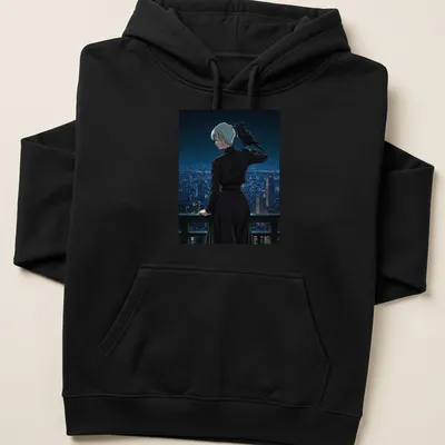 Contemporary manga character with a crow over an urban skyline in black and grey — printed on a unisex hoodie