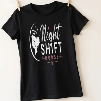 Night Shift Nurse shirt with elegant typography in white, pink, and red — printed on a women's shirt