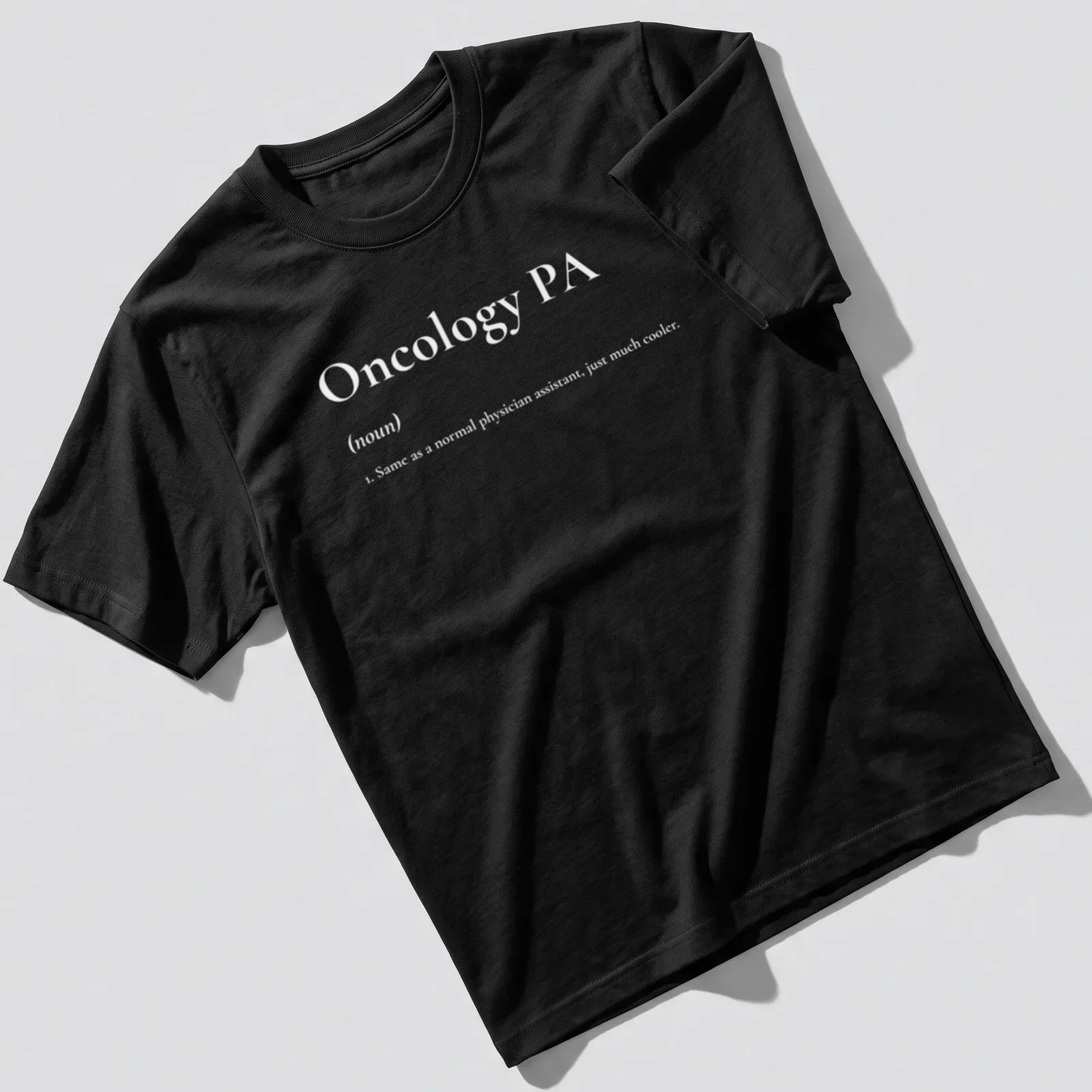 Modern Oncology PA t-shirt featuring blue lettering on a white background — printed on a unisex t-shirt