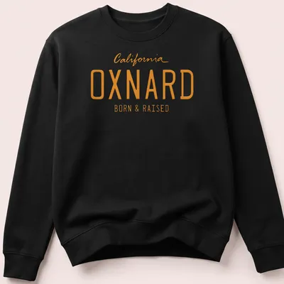 Bold Oxnard California Born & Raised t-shirt with modern typography — printed on a unisex sweatshirt