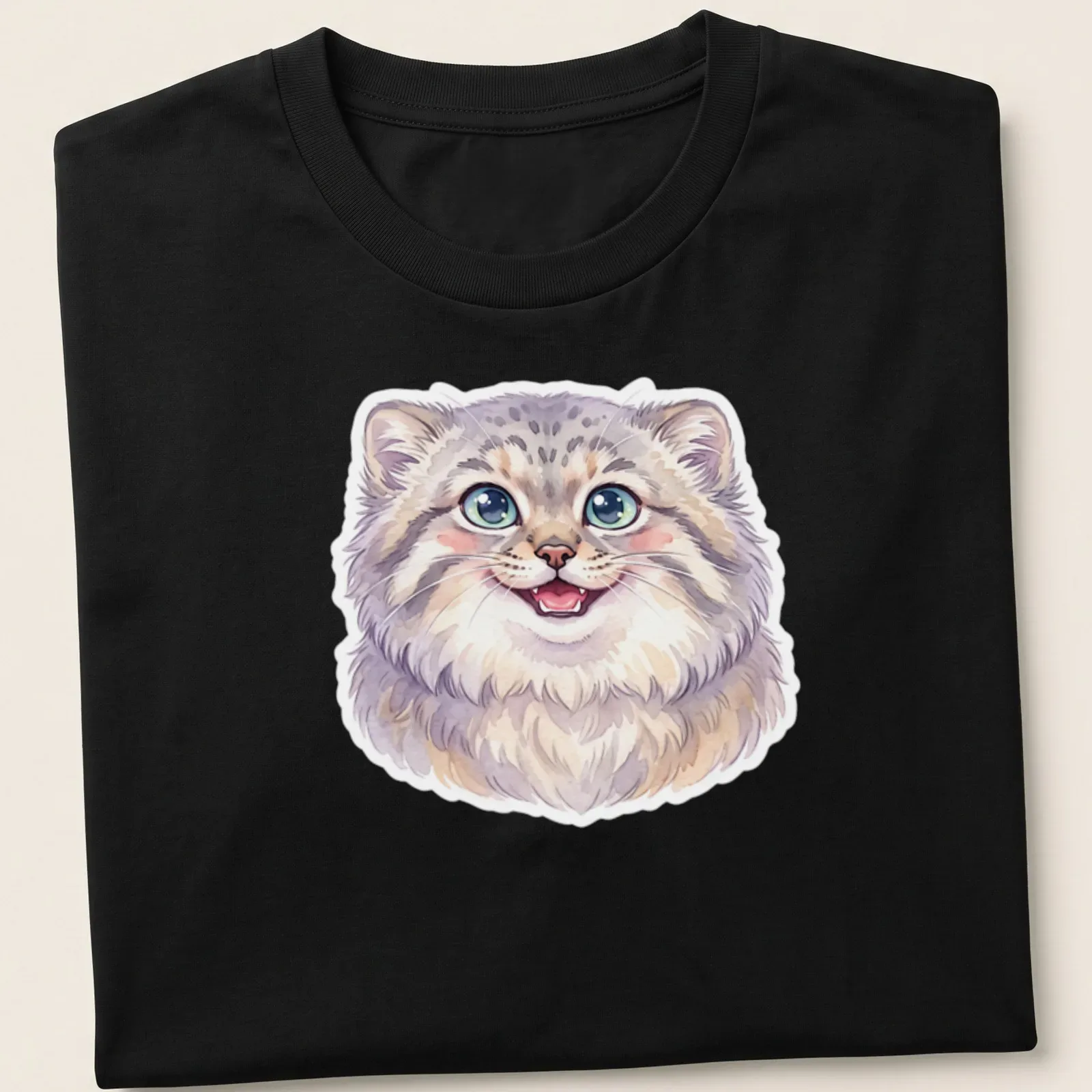 Watercolor illustration of a smiling Pallas cat in gray, white, purple, and blue — printed on a unisex t-shirt