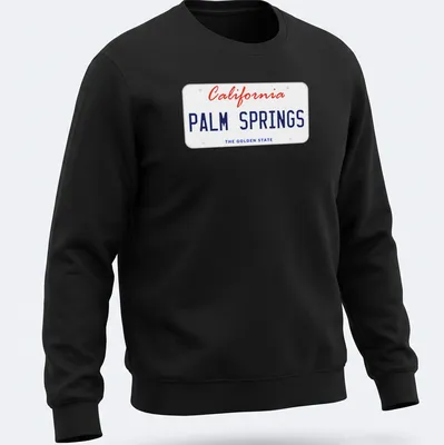 Vintage license plate design featuring Palm Springs, California, in red, blue, and white. — printed on a unisex sweatshirt