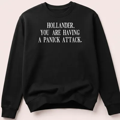 Bold typography t-shirt featuring the quote about panic attacks in black and white. — printed on a unisex sweatshirt