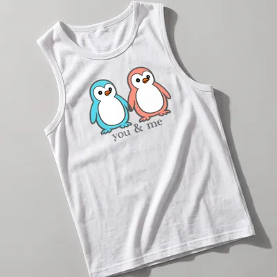Kawaii design of two penguins holding flippers with 'you & me' text — printed on a tank top