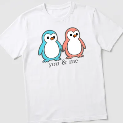 Kawaii design of two penguins holding flippers with 'you & me' text
