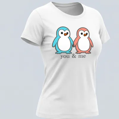 Kawaii design of two penguins holding flippers with 'you & me' text — printed on a women's shirt