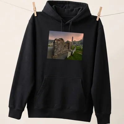 Photographic print of a ruined stone structure and round tower with vivid colors — printed on a unisex hoodie