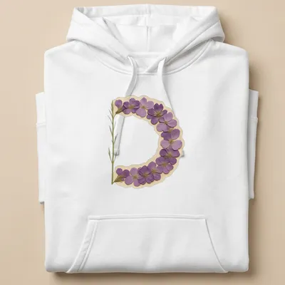 Vintage pressed T-shirt featuring a floral letter D in purple, green, and beige — printed on a unisex hoodie