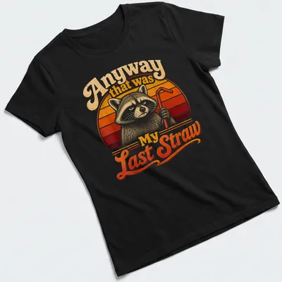 Vintage retro t-shirt featuring a cartoon raccoon and humorous text about straws — printed on a women's shirt