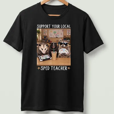 Photorealistic raccoon holding an apple with text supporting SPED teachers — printed on a unisex t-shirt