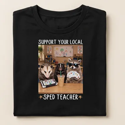 Photorealistic raccoon holding an apple with text supporting SPED teachers — printed on a women's shirt