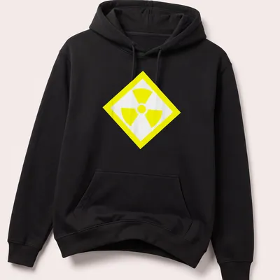 Vintage radioactive symbol T-shirt in bold yellow and white — printed on a unisex hoodie