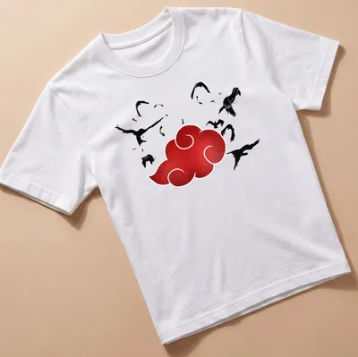 Stylized red cloud with black birds flying on a T-shirt