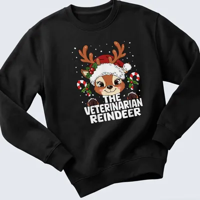 Kawaii cartoon reindeer with text 'The Veterinarian Reindeer' in festive colors — printed on a unisex sweatshirt