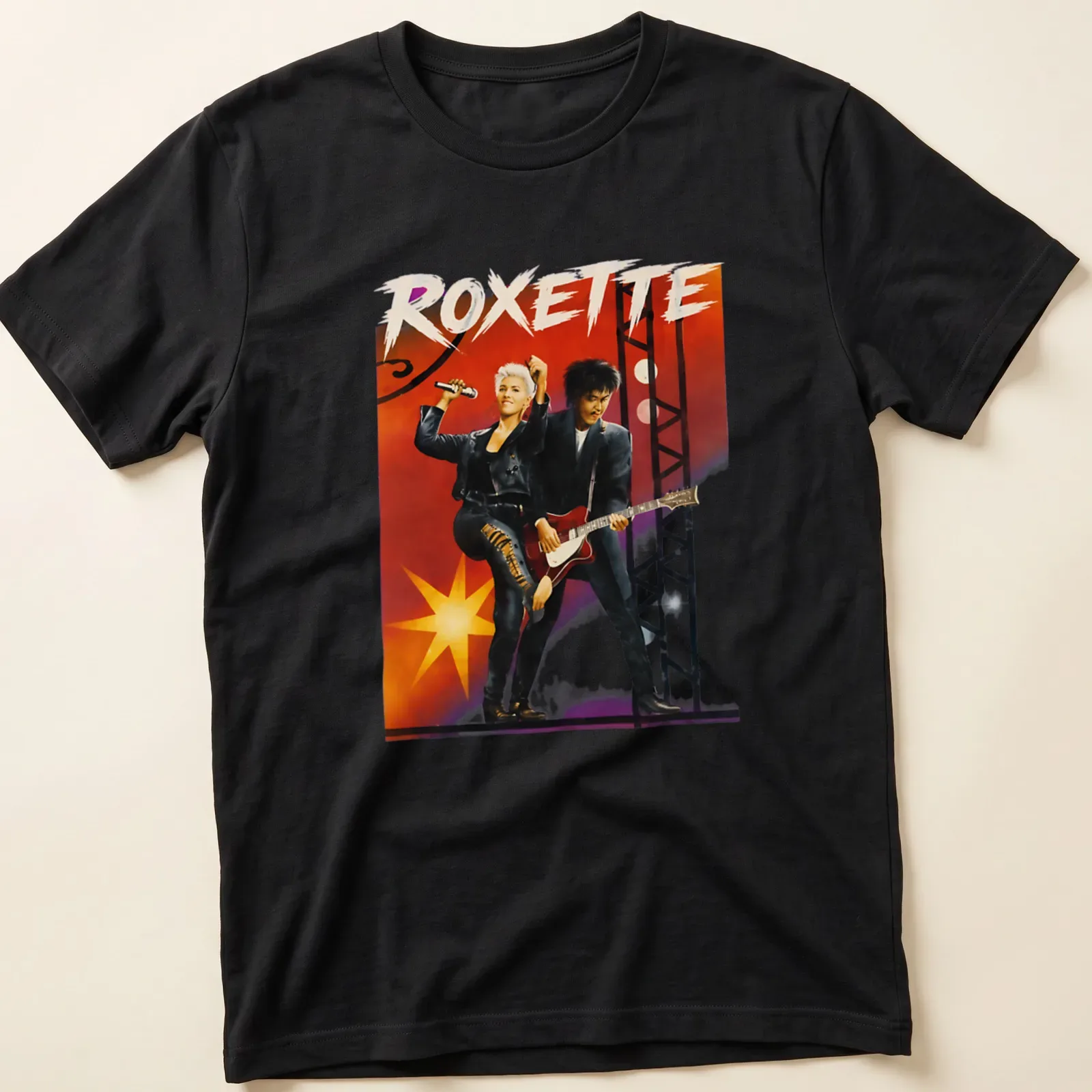 Vibrant illustration of Roxette performing, featuring bold lettering and colorful accents. — printed on a unisex t-shirt