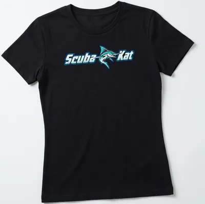 Bold graphic of a scuba diving cat next to a marlin fish in turquoise and black — printed on a women's shirt