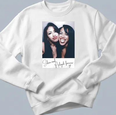 Vintage tribute t-shirt featuring Selena and Aaliyah with nostalgic text — printed on a unisex sweatshirt