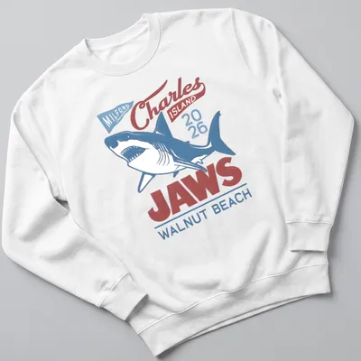 Vintage T-shirt featuring a shark graphic with red, blue, and white text. — printed on a unisex sweatshirt