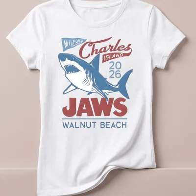 Vintage T-shirt featuring a shark graphic with red, blue, and white text. — printed on a women's shirt