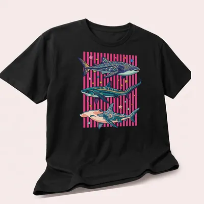 Colorful cartoon sharks in a tropical ocean scene on a summer — printed on a unisex t-shirt (angled view)