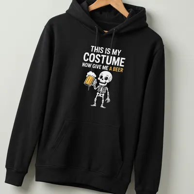 Cartoon skeleton holding a beer mug with humorous text about Halloween costume. — printed on a unisex hoodie
