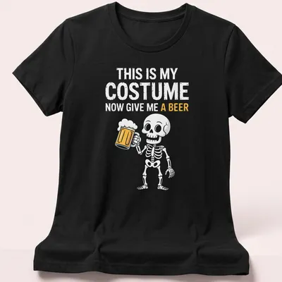 Cartoon skeleton holding a beer mug with humorous text about Halloween costume. — printed on a women's shirt