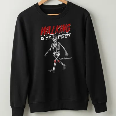 Line-art skeleton design with text 'WALKING IS MY VICTORY' in red, white, and black. — printed on a unisex sweatshirt