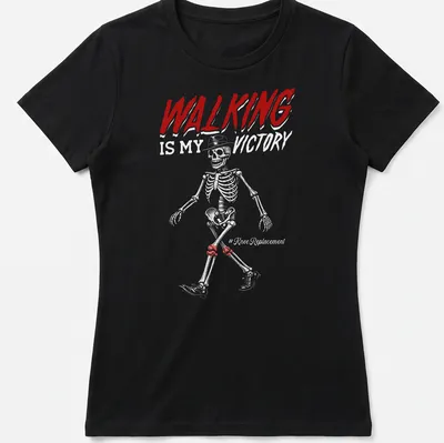 Line-art skeleton design with text 'WALKING IS MY VICTORY' in red, white, and black. — printed on a women's shirt