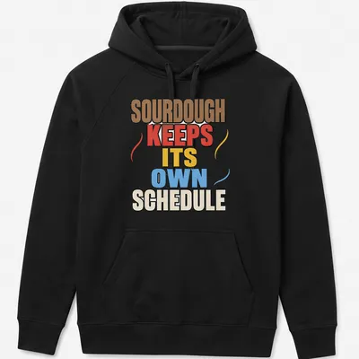 Bold retro design featuring sourdough bread with colorful text — printed on a unisex hoodie