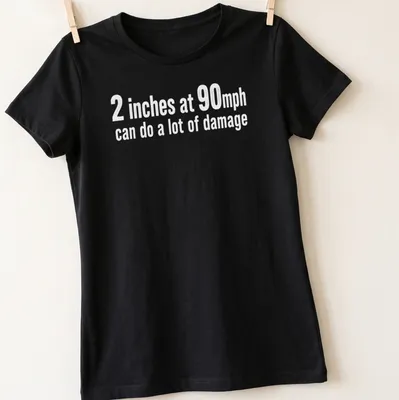 Bold typography t-shirt featuring humorous speed-related text — printed on a women's shirt