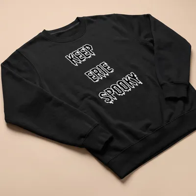 Dripping font t-shirt with Keep Erie Spooky design in black and white — printed on a unisex sweatshirt