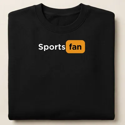Bold typography Sports Fan t-shirt in black, orange, and white colors — printed on a unisex sweatshirt