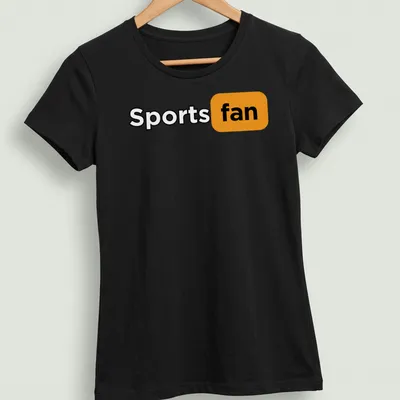 Bold typography Sports Fan t-shirt in black, orange, and white colors — printed on a women's shirt