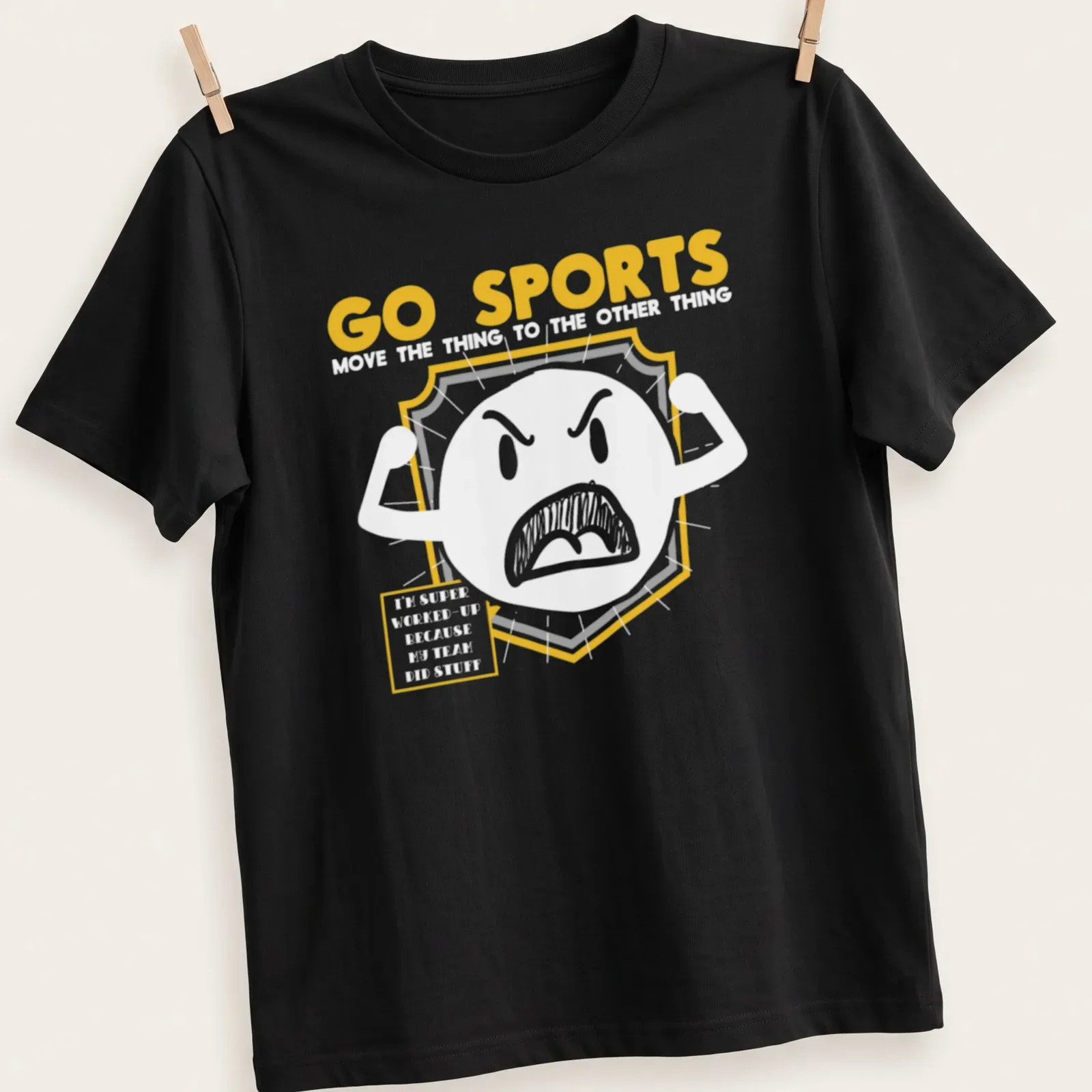 Bold sports shield graphic with GO SPORTS text in yellow, gray, and white — printed on a unisex t-shirt