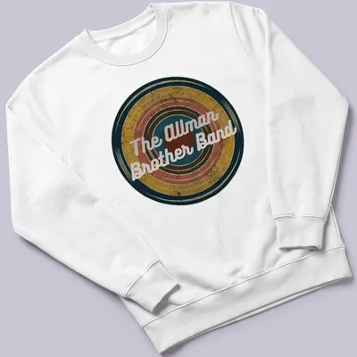Vintage Allman Brother Band t-shirt featuring colorful text in a retro style — printed on a unisex sweatshirt