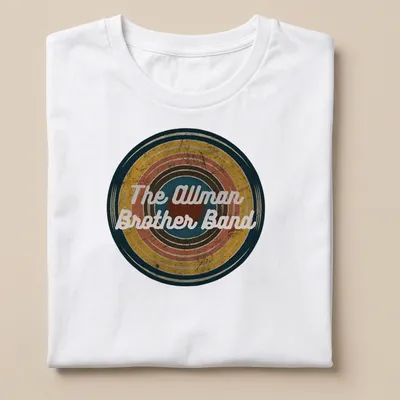 Vintage Allman Brother Band t-shirt featuring colorful text in a retro style