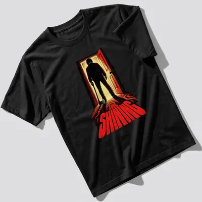 Vintage horror tee featuring iconic axe-wielding figure from The Shining