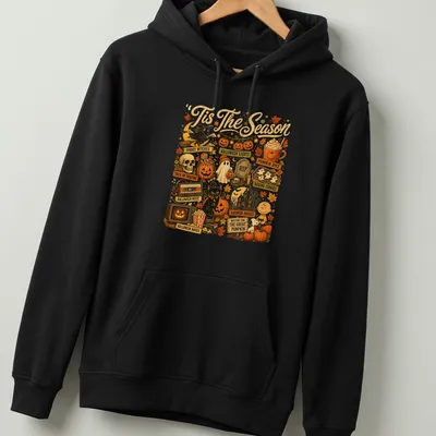 Retro Halloween tee featuring spooky witches and festive autumn symbols — printed on a unisex hoodie