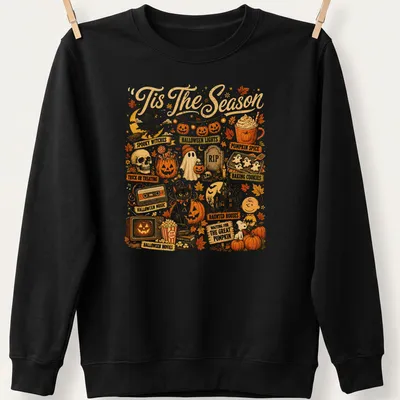 Retro Halloween tee featuring spooky witches and festive autumn symbols — printed on a unisex sweatshirt
