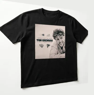 Vintage Tom Grennan Halftime Show shirt featuring concert details in black and white — printed on a unisex t-shirt (angled view)