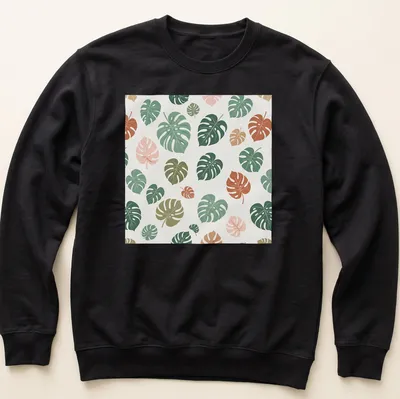 Botanical pattern T-shirt featuring tropical Monstera leaves in various colors — printed on a unisex sweatshirt