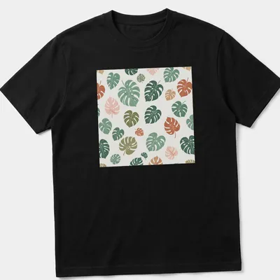 Botanical pattern T-shirt featuring tropical Monstera leaves in various colors