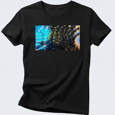 Abstract design of caviar vessels with the phrase 'Vessels Of Abundance The Caviar And The Turning Tide' — printed on a women's shirt