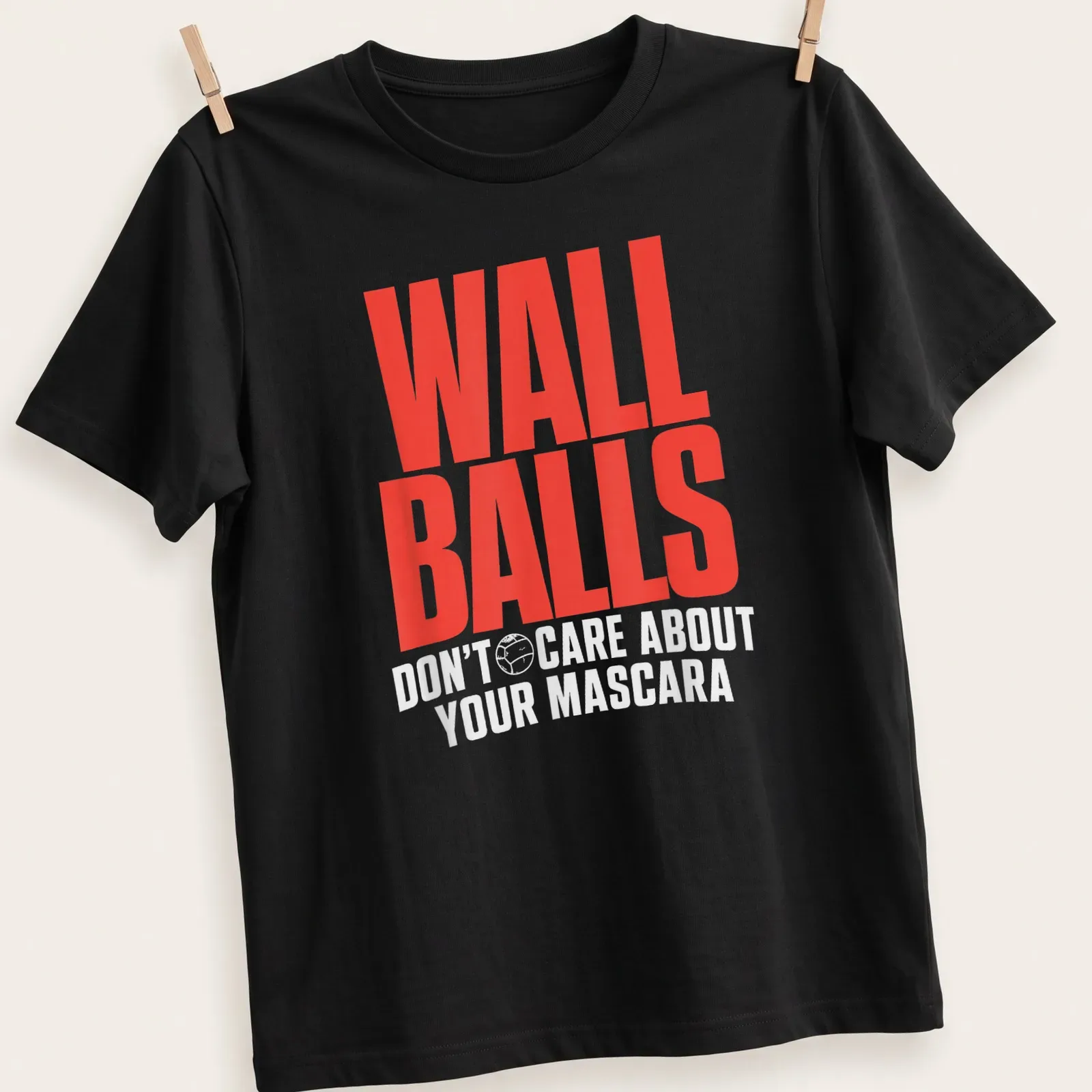 Bold typography Wall Balls Don't Care About Your Mascara tee in red and white — printed on a unisex t-shirt