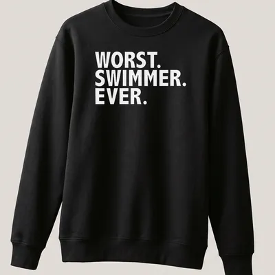 Playful cartoon of a swimmer with text 'Worst Swimmer Ever' in blue, yellow, and white — printed on a unisex sweatshirt