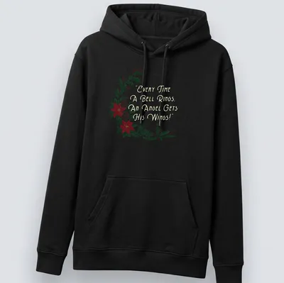 Illustrative T-shirt with a wreath, flowers, and the quote about angels' wings. — printed on a unisex hoodie
